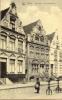 Undated postcard featuring a soldier in front of 
"Yperen Gildenhuizen op de Veemarkt"(Yperen Guild Houses on the Veemarkt)in Belgium.