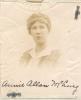 Photograph of Annie McLurg attached to her travel documents, 1918