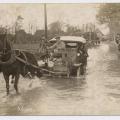 Car pulled by horses through water Salisbury Plain Floods, England 1915 Photo by Fuller Amesbury