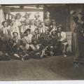 Complete cast of theatre production “Roll on Blighty,” German P.O.W. Camp Rennbahn, 1918, WWI