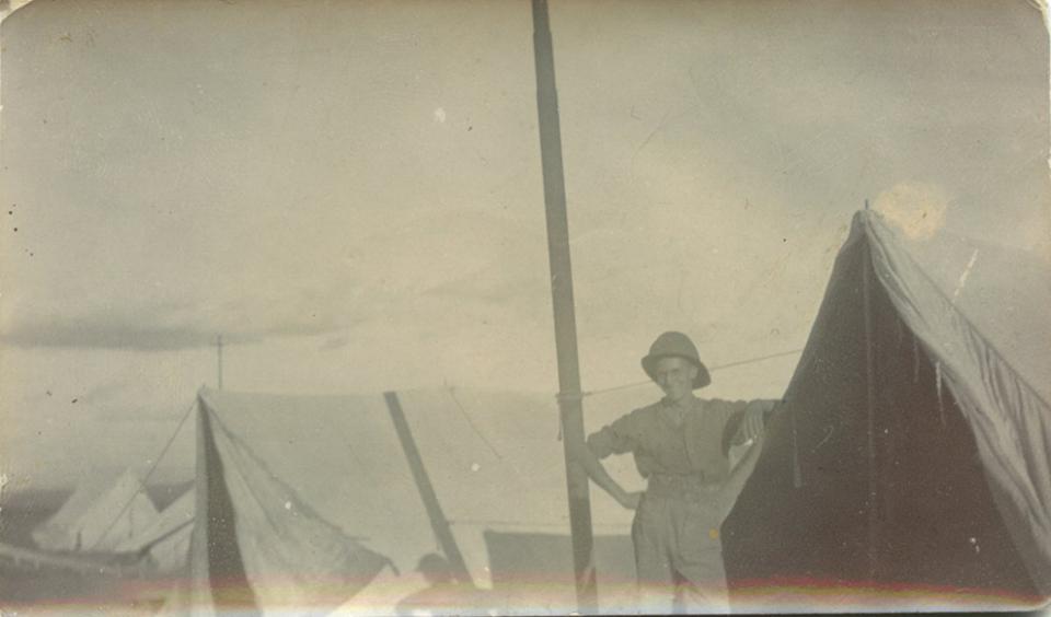 Private Harold Dean outside his tent in South Africa, B.E.F., WWI 