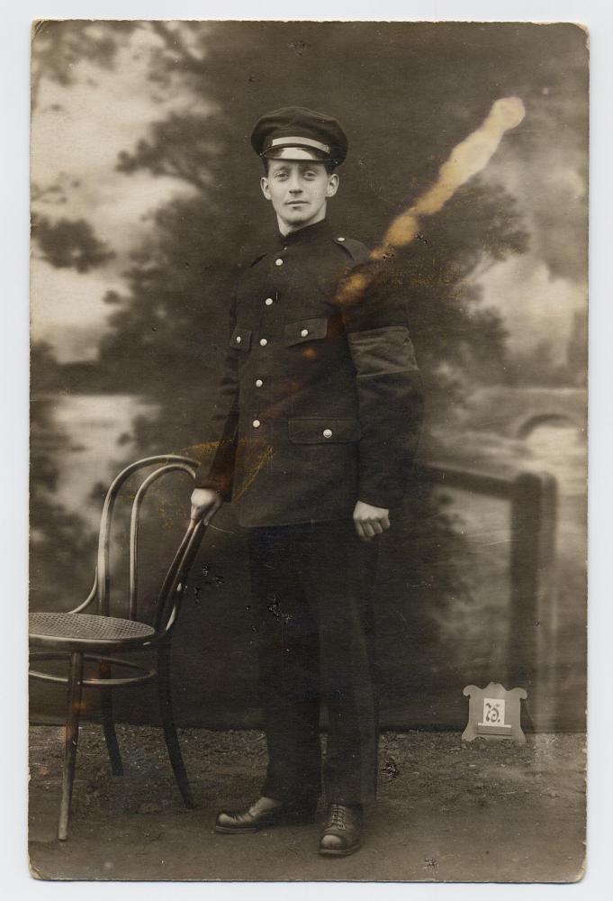 Pte. William McLeish in uniform, wearing P.O.W. armband, date unknown.